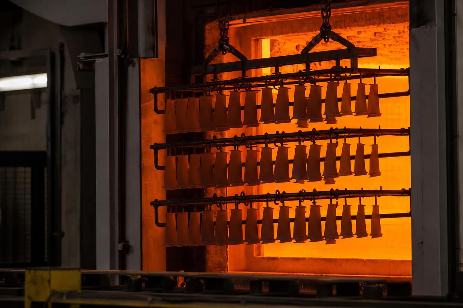 Gas turbine blades on a heat-treatment rack